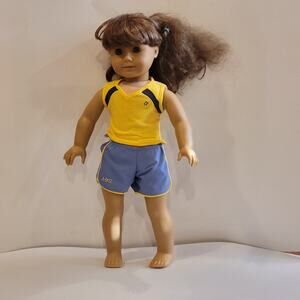 American Girl Doll Grey eyes light brown  hair.